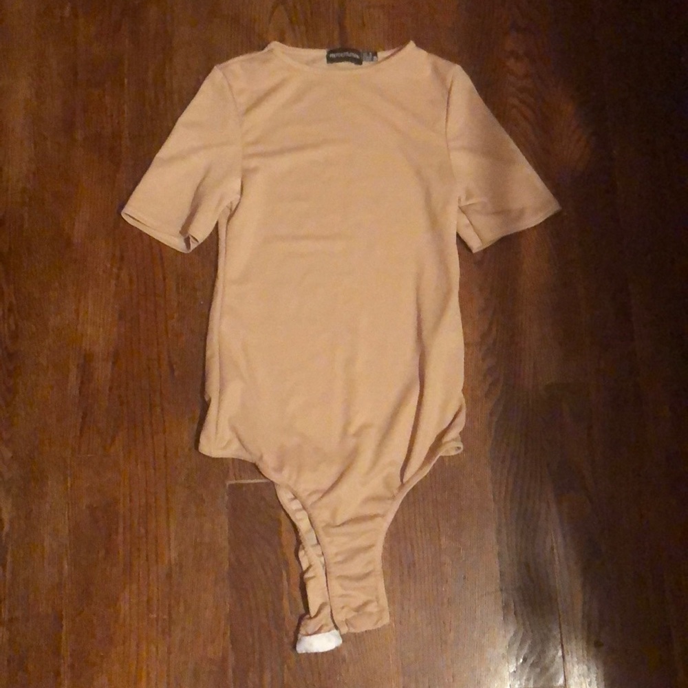 NWOT Pretty little thing nude body suit.